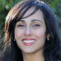 This is Puja Malhotra's avatar and link to their profile