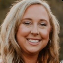 This is Ashley Holcomb's avatar and link to their profile