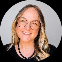 This is Mitzi Pope's avatar and link to their profile